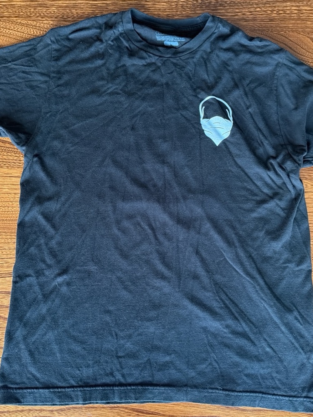 Black Short-Sleeve Graphic Tee with Light Blue Accent
